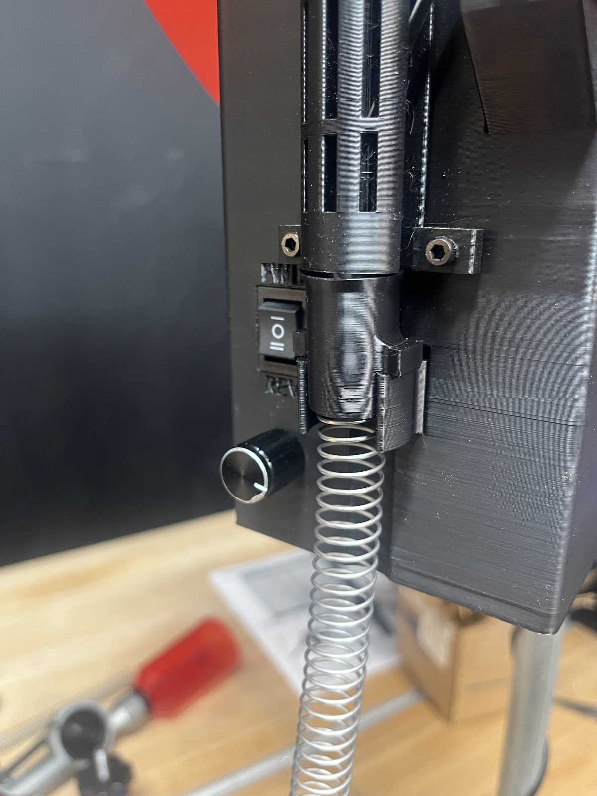 Case Feeder Spring Adapter connecting the spring to the case feeder tube